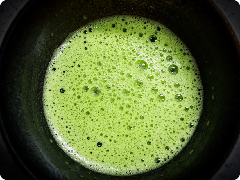 Hand-whisked organic matcha powder in a tea bowl – wholesale supply